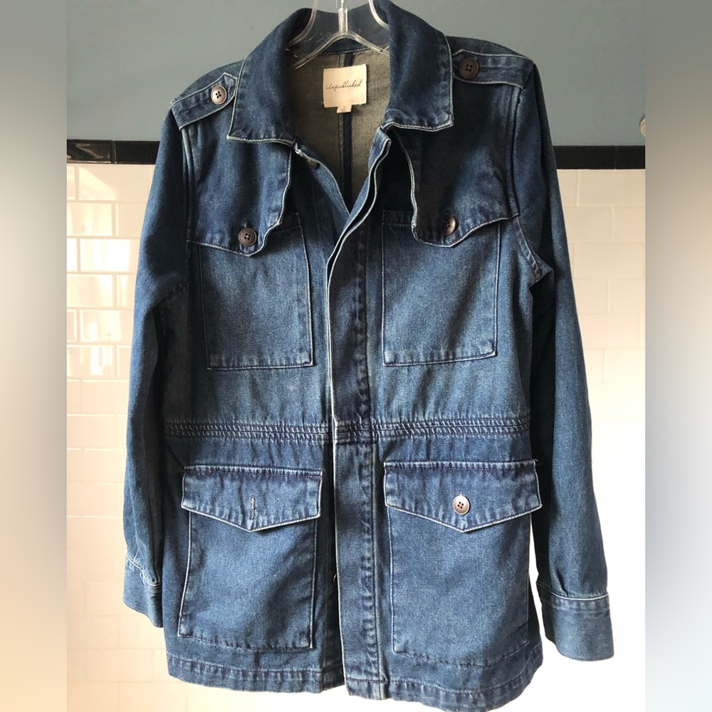 Anthropology barn style jean jacket. Somewhat fitted with lots of pockets.